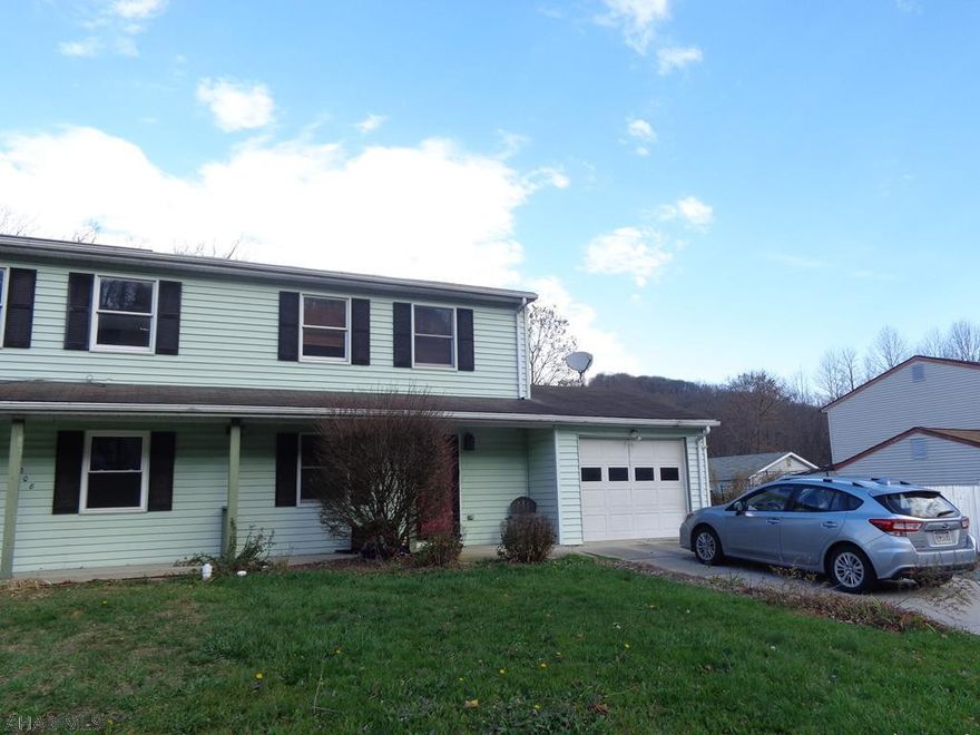 Move right into this affordable 3 BR half of a home.  Spacious eat in kitchen with new wood laminate flooring.  All appliances included.  Private fenced in back yard with a deck & fire pit. Screened in porch. Shed included.