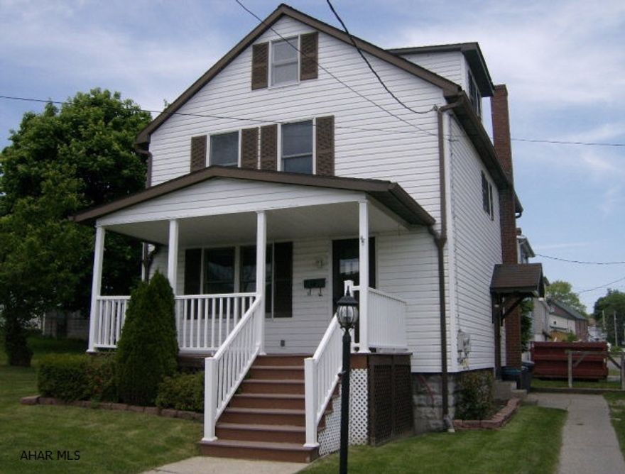 2 story, 3 BR home on a 50 x 71 lot. Parking in rear