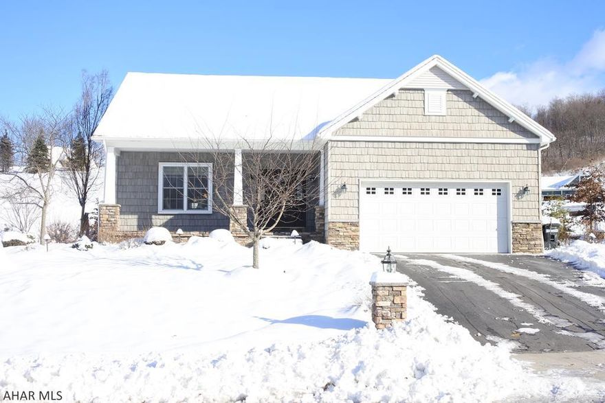 Newer home in Pleasant View Estates.  Open concept, with recessed lights, stone columns and built-ins.  Huge granite island with breakfast bar, lots of kitchen storage, dining area and doors to a covered, stamped concrete patio.  Living is easy with the spacious owners' suite, walk-in closet, master bath and laundry ALL on the first floor.  2nd floor is a perfect kids' retreat with 2 additional bedrooms, a full bath and bonus room.  The lower level almost doubles your living space....a family room, play area, 3/4 bath and queen sized, built-in bunk beds ( 4th BR?, genius design).  Craftsman Style Exterior...covered porch, stamped concrete.  There is a heated 2 car garage.  Landscaping done by Tussey Mountain.  Quality inside and out!