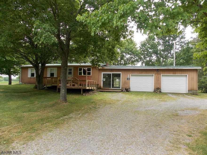 Great property near Prince Gallitzin State Park! Large living room with a wood-burner. Nice kitchen that has a center island. 3 bedrooms and a 3/4 bathroom. A 2 car attached garage is great for storage. 2 flat Acres of peaceful property that borders State Game Lands. Take a walk in woods or go fishing at the lake! If you're looking for weekend getaway this property is perfect!