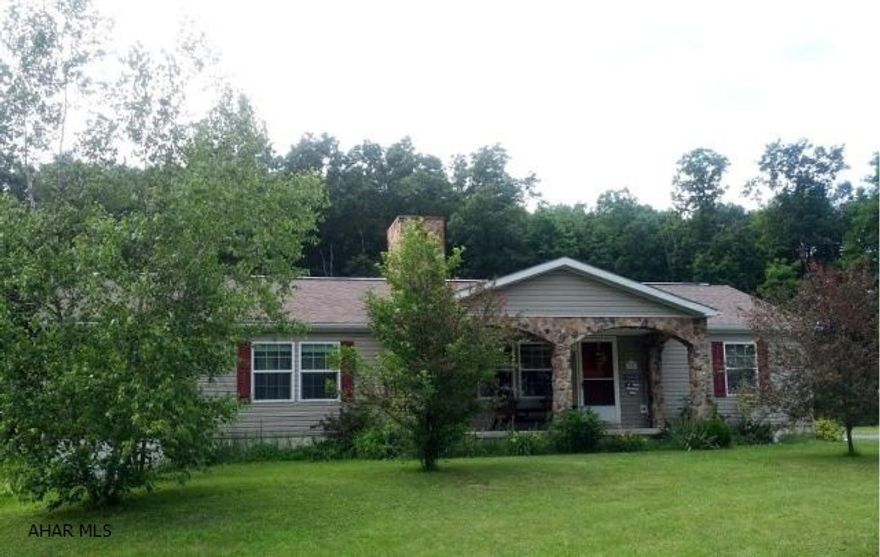 Spring Cove Schools. 3 bedrooms, 2 bath, 2001 drywalled doublewide, finished basement, screened porch, vaulted ceilings and 15.9 ACRES!!!! Basement plummed for bath. Nice home with breezeway and attached garage at end of cul-de-sac.  15.94 Acres is according to Tax Card. (Tax Map and Old Survey attached)  #J-260