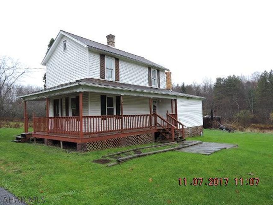 great opportunity for the handy man.  Nice size rooms and big level yard.  Modern kit and bath, first floor laundry.  Garage may encroach on neighbors property.  Sewer is serviced thru Muddy Run Sewer Authority.  Water is available nearby thru Houtzdale Municipal Authority.  Buyer should confirm costs with them