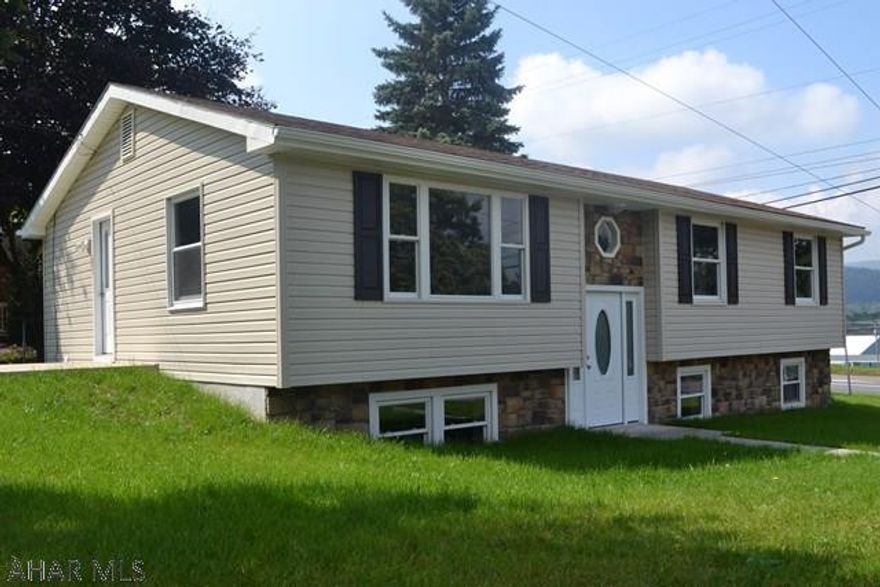 LOOKING FOR OFFERS!  This 3-4 bedroom bi-level is basically BRAND NEW and impressive from the second you enter.  Starting outside the siding & stone work are brand new.  Inside there is not really a corner that's been untouched.  BRAND NEW flooring, windows, wiring, heat pump + Central air, Plumbing, entirely new kitchen and baths, & the list goes on.  Upstairs has 3 BR, a beautifully tiled bath, & stylish open kitchen & dining area with bar pass through to living room.  You'll love the custom railing!  Basement is HUGE with a large rec room that is a walkout,  a perfect den/playspace, or possible 4th BR, as well as another BRAND NEW bath, & a utility/storage room. All this and more, and it's BAKER ELEMENTARY too. Call to set up your showing!