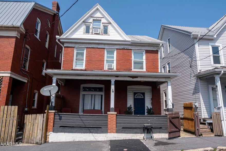 Solid brick home with 3 bedrooms plus a large finished attic that works well as a fourth bedroom or flex space. 

It features a living room, formal dining room, and original wood pillars that add character. The kitchen includes a range and refrigerator. A full basement offers plenty of storage.. 

Previously used as a successful Airbnb and mid-term rental, this property offers solid potential for both homeowners and investors. Convenient location near schools, shops, and transit.

Listing agent has a financial interest in the property.
