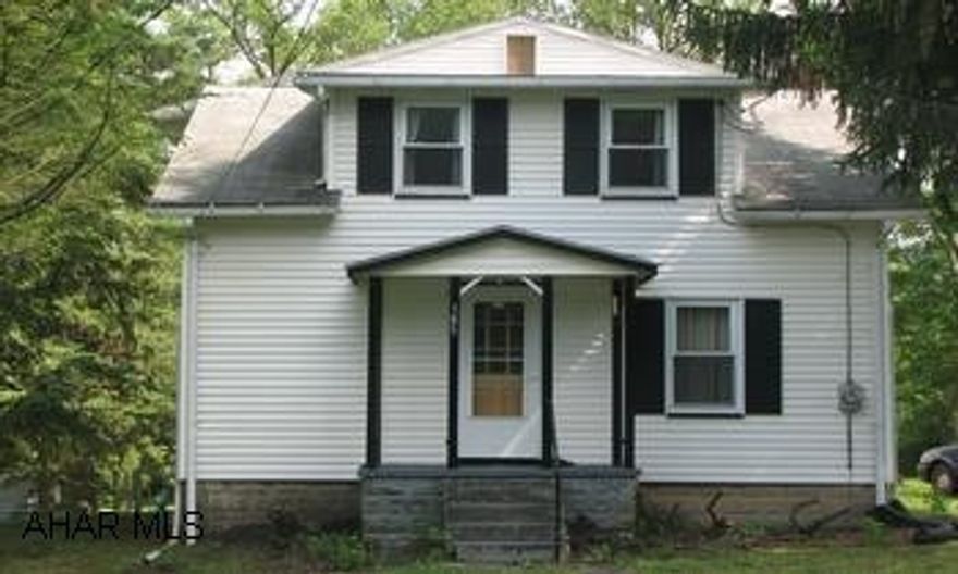 BRAND NEW 1ST FLOOR KITCHEN AND BATH.  NEW HARDWOOD KITCHEN FLOOR.  COVERED DECK.