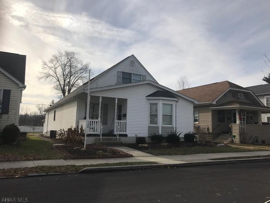 Nice open floor plan. Much larger than it appears, nice oak kitchen, dining area, living room, master bedroom with 2 master baths, plus half bath and laundry on main floor. Second bedroom on 1st floor. Two bedrooms plus bonus room and full bath on second floor. Plus two car detached garage.