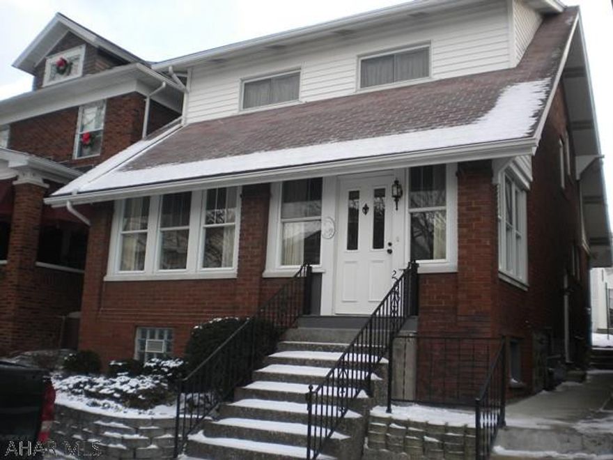 Taxes 2017 - $906. Solid brick & vinyl home. 2 car garage. Modern eat in kitchen, newer windows. Fenced in yard (fencing is neighbor's).