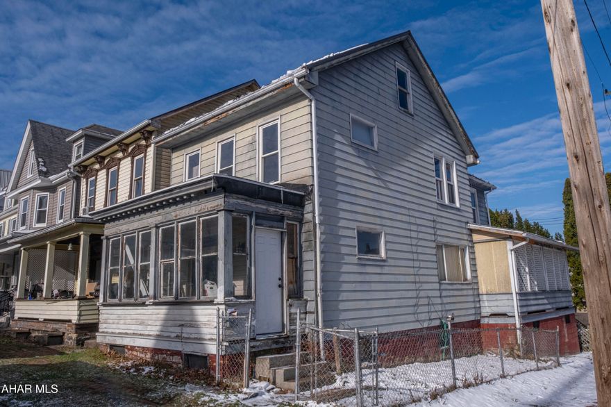 Spacious 2,000+ sq ft corner-lot home in Altoona featuring a newer metal roof, updated furnace, and hot water tank. Many upgrades have already been completed, offering a solid head start for the next owner to finish and add their personal touch. With generous square footage and strong mechanical updates in place, this property presents a great opportunity for customization and value-add potential.