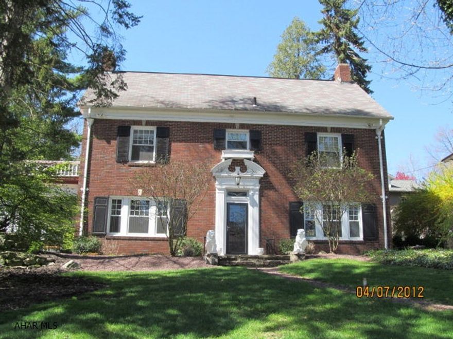 Beautiful stately brick home with all the original charm but modern conveniences. New maple kitchen and SS appliances, charming LR with fireplace, hardwood floor and 2 sets of french doors out to the side porch. New lifetime hot water heater and high-efficiency furnace. Detached one-car garage in front of property and driveway and parking area in rear. Both the side porch and garage have new metal roofs. Conveniently located between Altoona, State College & Huntingdon with easy access to I99.