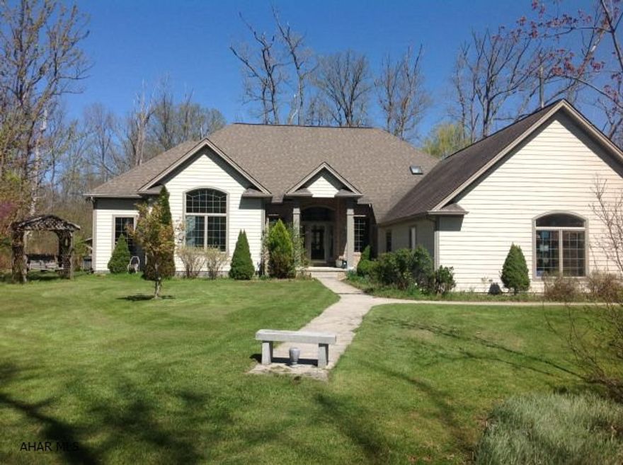 Beautiful and Peaceful. One Story home located on 4.63 Private acres.This Open Concept home offers a huge Living Room  with Vaulted Ceiling, Gas Fireplace and large windows looking out to the Private Screened in Patio. Beautiful large kitchen with Granite Counters, Center Island with Cook Top. Bright and Roomy Breakfast Nook, Large Walk In Pantry. Laundry is located right off the Kitchen, also the Dining Room, Office/Den and Entrance Foyer are all part of the Main Area. Large Master Bedroom with Beautiful Master Bath and Walk In Closet. Many more amenities...come see!!