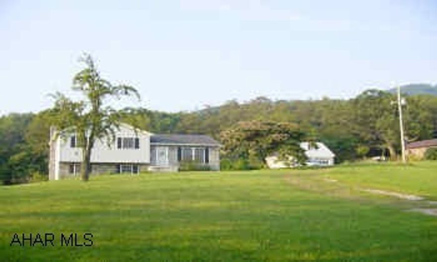 Spectacular view comes with this beautiful 4- yr old multi-level home, 14 acres with fruit trees, stream, boarders state game land.  Relax on deck watching the wildlife.  Must see!! Spectacular view comes with this beautiful 4-yr old multi-level home, 14 acres with fruit trees, stream, boarders state game land.  Relax on deck watching the wildlife.  Must see!!