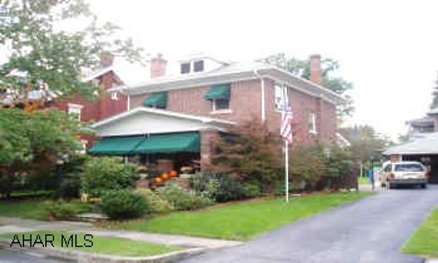 BRICK BEAUTY IN THE BORO!  Updated throughout!  Living room w/ brick fireplace, beautiful pergo floors, newer custom ceramic tile bath, rec. room in basement.  Large closets, 2 zone heat, plus comm'l. grade air conditioner.  Share 1/2 of 2-car garage. BRICK BEAUTY IN THE BORO!  Updated throughout!  Living room w/ brick fireplace, beautiful pergo floors, newer custom ceramic tile bath, rec. room in basement.  Large closets, 2 zone heat, plus comm'l. grade air conditioner.  Share 1/2 of 2-car garage.