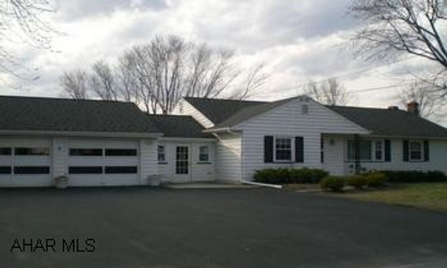 Great 3 bedroom on huge lot. Kitchen, dining room, family room, living room & 3 bedrooms all on one floor. Central air, new thermal windows, new spouting and soffits. New well pump and tank, water softner, new garage door, garage door opener. New basement water remediation system within the last few years. Home also has a wood burner. Roof is about 8 years old. New driveway about 4 years ago. Must see!