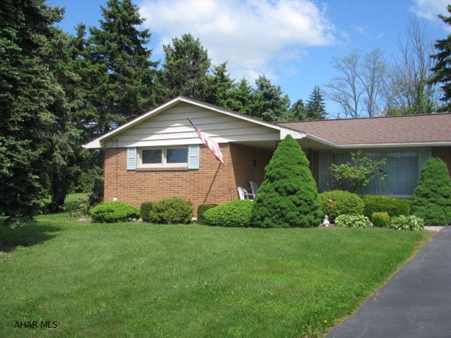 This is a beautiful well maintained home. Three nice size bedrooms and two brand new baths.  The basement is fully finished and has a complete kitchen. All new windows with warranty were installed in 2010. The Sunroom is a great bonus.  Sitting out there you will be in a world all your own.  A very beautiful and peaceful place to relax.