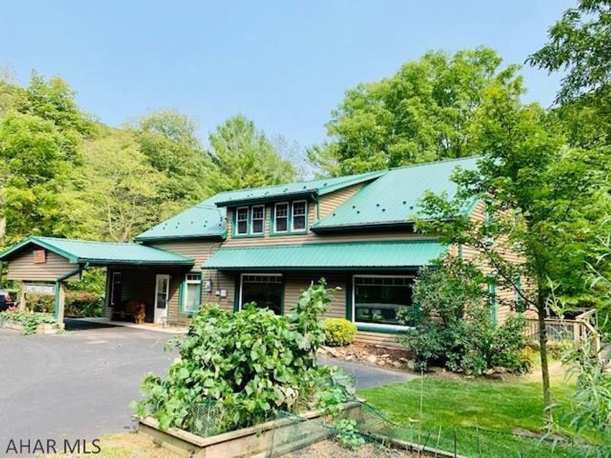 Known as the "1932 Picturesque" a Waterfront, Historic Structure Restored home brings family all the comforts. 1.37 acres backing Yellow creek a premier PA trout stream and surrounded by beautiful mountains of Bedford Co., near by Mid State trails and State Game lands. Picnic pavilion designed by the Amish overlooking the rushing water of Yellow Creek. Home Features an open concept, accented pine wood flooring and ceilings. 30,000 BTU central fireplace, lg refurbished bar/island, new kitchen appliances, french doors to the enclosed porch, vaulted screened in porch, and deck. The 2nd fl features,3 bed.2 full bath, bonus room/recess lighting, cathedral ceiling and storage. New electric, pex plumbing, York High efficiency heat pump, High speed internet, Wi Fi, sprayed insulation throughout!