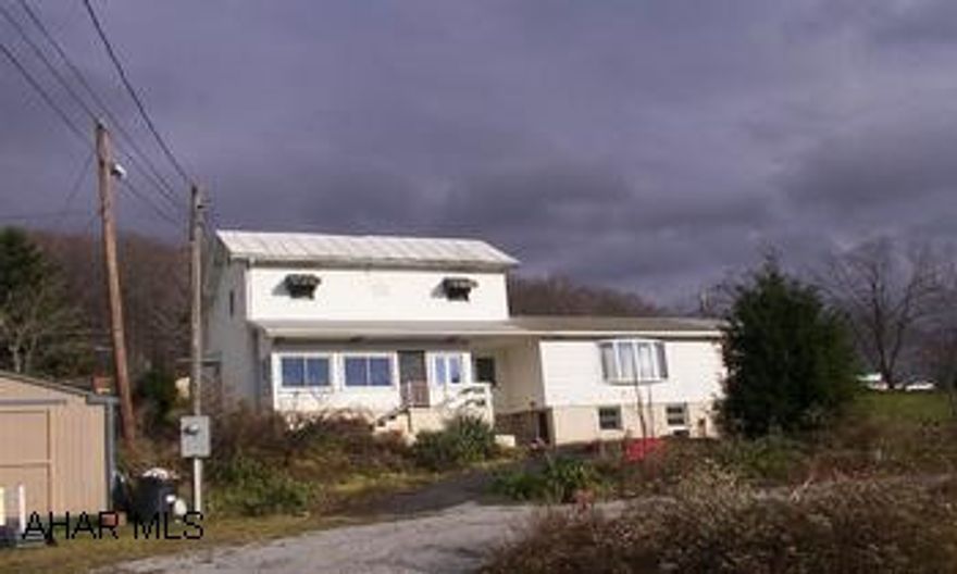 From Main Street, go to Walnut Street.  Go to Railroad Street. Beautiful immaculate home.  First floor laundry and family room.  Vinyl siding, Anderson windows, oversized one car garage.  Updated wiring, 2 heat sources, giant lot.  Move-in condition.  From Main Street go to Walnut Street.  Go to Railroad Street.