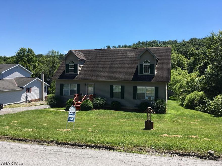 4 Bedroom, 2 bath Cap Cod home located in Tyrone. Master bedroom, large tub, shower and laundry all on the first floor. Second floor offers two bedrooms with 3/4 bath, Rec room with tons of space with a door leading to the outside. NEW FURNACE, newer water heater, sump pump and laminate floors. Enjoy evenings near the brook in the back of the .61 acre lot.