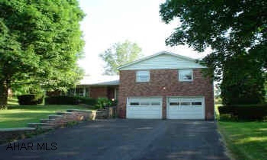 Large split level, brick on four sides! Lots of potential! Needs some cosmetics. Some exclusions from listing agreement - call listing agent. Large lot!