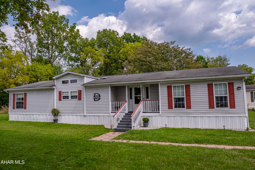 This stunning home offers 3 spacious bedrooms, 2 full baths, and an expansive open-concept design with custom vaulted ceilings, large windows, and a cozy fireplace. With many updates throughout, this home is move-in ready and includes all appliances. The master suite features a walk-in closet, a luxurious bath with a soaking tub, and a separate shower. Enjoy the comfort of central air, a private deck, and extra storage in the shed. Experience the ease of one-story living in this beautiful 55+ community. This home is a must see! Schedule a tour today!