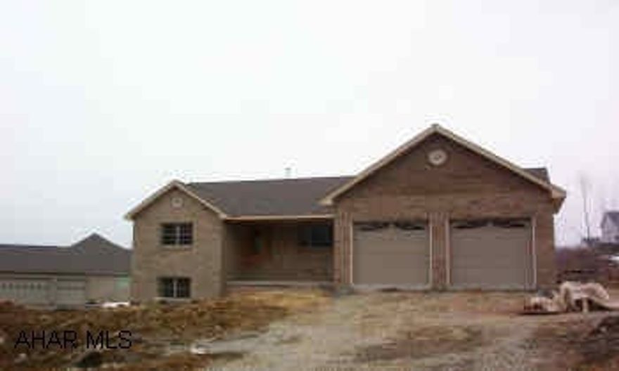 Rancher with 3 bedrooms or 4. finished basement. Open living area.