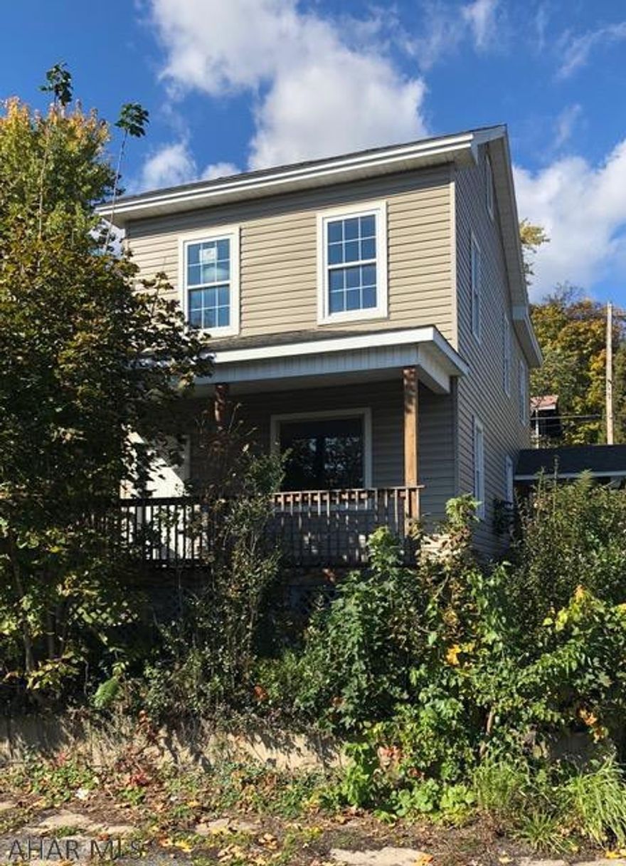 INVESTORS HERE IS YOUR WINTER PROJECT!! Completely gutted and ready for you to make it a 1st time buyers dream. Currently it is framed as a 3 bedroom, 1.5 bath, but can be made into anything you choose. New siding, windows and roof. Sits on a corner lot with a garage that can be torn down to reveal a perfect parking pad. Great comps in surrounding area.