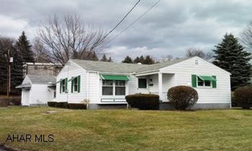 2 bedroom rancher with 1 car attached garage on corner lot. Breezeway. 2 bedroom rancher with 1 car attached garage on corner lot. Breezeway.