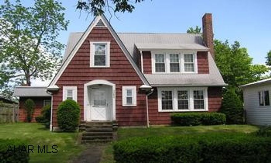 Quaint cedar shingle cottage and guest house on beautiful landscaped lot with mountain views. Large kitchen with oak cabinets galore. Stone fireplace in living room, 1st and 2nd floor bedrooms and baths, cheerful sun room, privacy fence, storage shed, pavillion, hardwood floors, skylights.