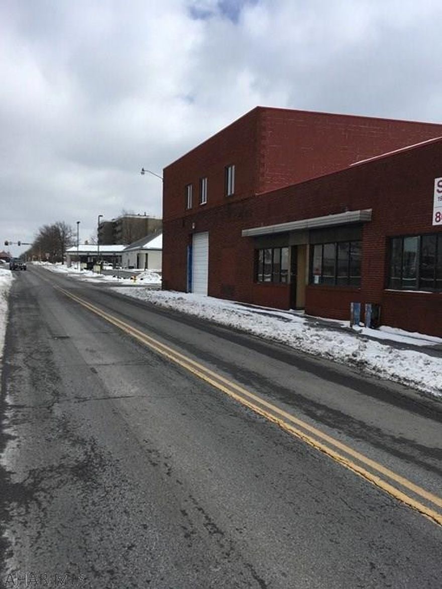 Great visibility, tons of possibilities. Lots of office space on 2nd Floor with Huge warehouse on 1st fl with some retail space.