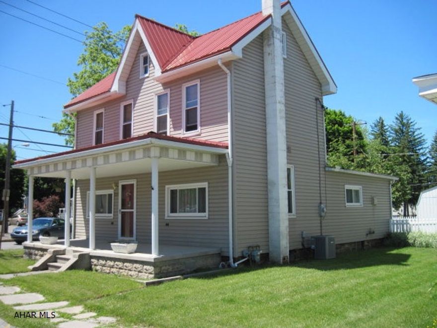 This house is located in the Borough of Duncansville and presents itself well. Lined with a white picket fence. This 2.5 story house features include: On the first level a living room, family room and den, half bath, laundry room, dining room and kitchen complete the first level of this house. Along with stools at the island which makes for quick meal seating. The second level features include, 2 bedrooms, full bath with tub and shower. Access to the walk up attic provides much storage. This house is well set on a corner lot and has a detached garage with additional gravel parking for two cars.