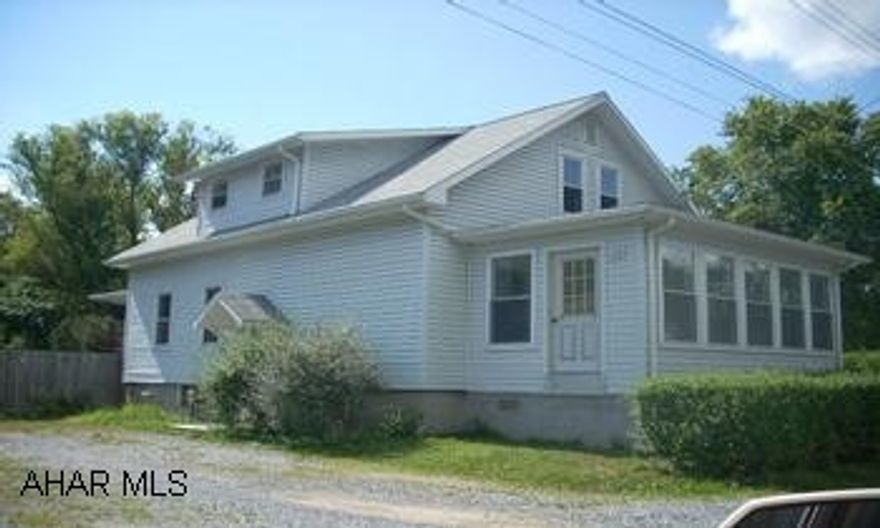 4 bedroom home in the Boro - newer roof, newer vinyl siding, good size. Very nice sunroom. Needs some interior TLC.