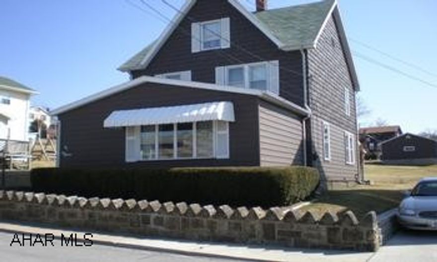 Well maintained 2-story home - was a two family and could easily be converted back. Nice yard. 2 car detached garage.