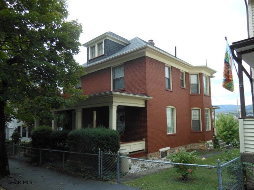 Lots of character in this 2 1/2 story solid brick home, 4 bedrooms, one bath, large attic unfinished, could be 5th bedroom. Newer furnace, convenient location, large fenced lot, detached garage, some new windows, new roof 2008.New 100 AMP service April 2013.