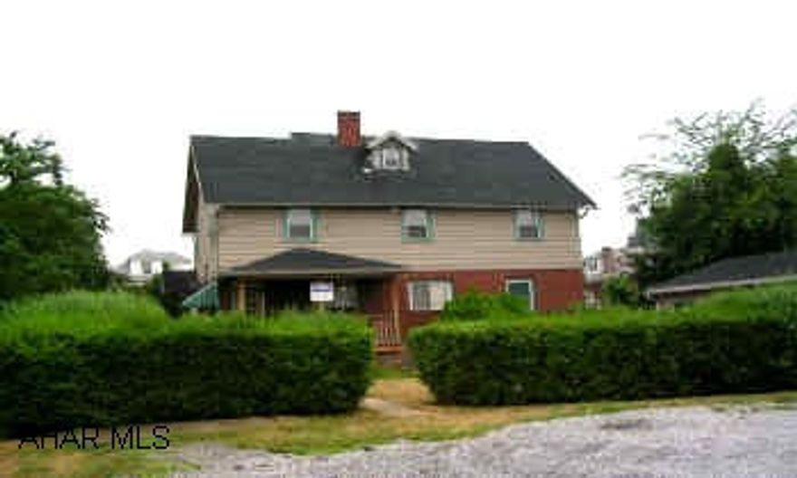 1ST FLOOR TOTALLY REMODELED FOR A PROFESSIONAL OFFICE.  2ND APARTMENT UNOCCUPIED.