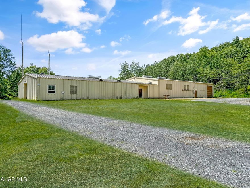 Welcome to 108 Kinter Road in Barr Township, Cambria County PA. This breathtaking property features 33.5 acres of land, an approximate 1.5 acre pond stocked with trout & bass, 3 additional outbuildings & a HUGE 8,100 square foot garage / office. The main building features 3-4 offices, 3 bathrooms, 230 volt electric with 3 phase (previously a machine shop), air compressor hookups, parts / tool room, 12x12 garage door, & so much more. The exterior also features plenty of parking & room for expansion. Call for more details today!