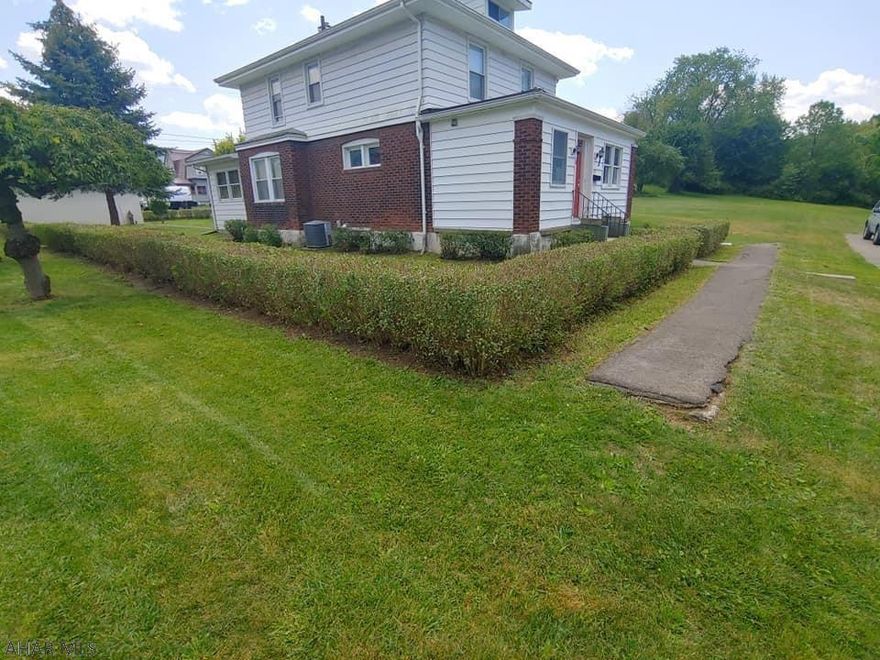 East End area of Altoona situated on four city lots meticulously maintained. Offering TWO detached garages...a one car and a two car.The home offers four bedrooms and one and a half baths. Large eat-in, L-shaped kitchen, dining room with built-ins, large living room with a gas fireplace, central air  & an enclosed front porch that would make a great office or play room. Nice deck off the kitchen,,,just walk out the sliding doors. This home is located in the city but has the country feel.  Easy to show. Don't miss this one.....it's not going to last! Call me today for your private tour.