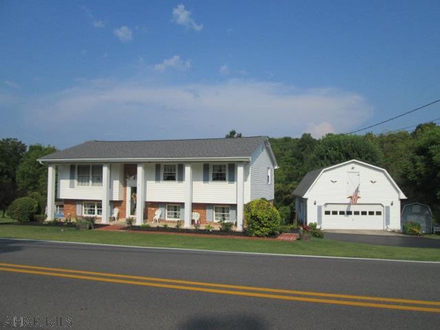 Immaculate bi-level with many updates on large flat lot!  Enjoy your morning coffee while sitting in the heated back sun room.  The eat-in kitchen has been recently updated and all appliances are included.  The formal dining room features hardwood flooring.  The lower level is totally finished and has two family rooms.  The private rear patio is nicely shaded with a removable awning.  Detached 2 car garage with large room overhead for storage.