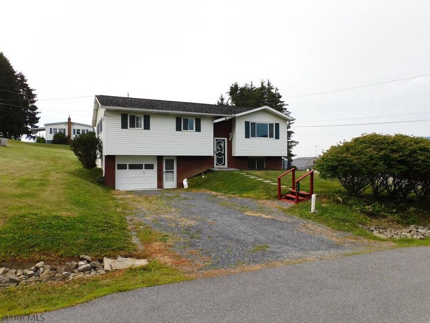 Great Bi-Level in East Freedom! Eat-in kitchen with an open floor plan to the dinning room. Spacious living room. Enjoy the summer months in the relaxing sunroom! Family room in the finished basement makes a great mancave. Plenty of parking and an integral garage. A large 127x 148 lot. Only minutes from I-99. All of this in the Spring Cove School District!