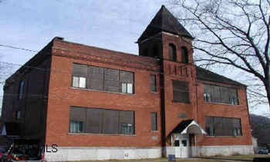 Washington Apartments.  Former school building with 10 apartments 8 Two bedroom apartments.  2 One bedroom apartments.  Owner pays water/sewer and garbage.  Tenants pays electric.  All separate electric.