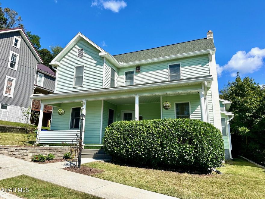 Welcome to this attractive and delightful quality home! Entering through the main entrance into the foyer, a lovely staircase enhances the spacious living room and its decorative fireplace, which adds  ambience to the room. Off the living room area is the beautiful kitchen with oak cabinetry accented with granite countertops, stainless appliances and Island you can seat up to 4 comfortably.  Bonus to kitchen is the laundry area which you can add an additional freezer and lots of storge and a side door to the yard.
The formal dining area would give you space for family gatherings and a 1/2 bath for guests. You will enter the den area that opens into master family room featuring a propane fireplace, spiral staircase to a balcony overlooking the large family area. This space has many possibilities, such as a reading room, a library, or some type of collectibles!!  The patio doors offer access to the large deck and to the backyard with a 2 car carport, 10x20 shed and alley access. Upstairs you have 4 bedrooms cedar closets and lots of window giving that natural light in each room. The bathroom tub is fully equipped with convenient soap dispensers while bathing or showering.  The  walkup attic provides additional storage or finish as a bonus room.  Location Location Location! Walking distance to downtown and all amenities. Schools are nearby for easy access. Call today for your tour!!