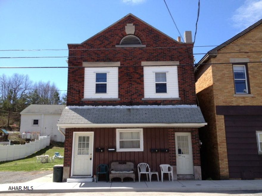 Brick 4 unit investment property, convenient location, off street parking, positive cash flow, fully occupied.