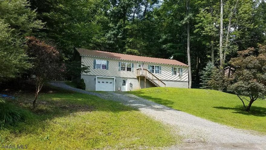 Attractive spacious 3 bedroom , 2 bath double wide on full foundation w/single car integral garage.New roof installed August 2018.  Enjoy sitting out on the deck watching wildlife. Minutes from Prince Gallitzin State Park, state game lands & Rock Run