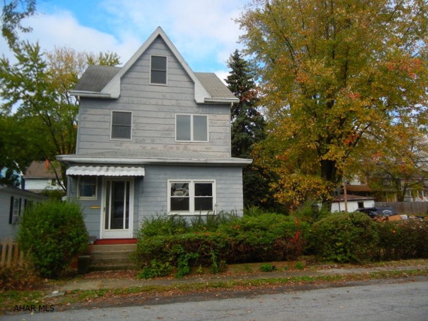 Just move in!  Seller's just painted and installed brand new carpet for you:) Most of the windows are newer. Lots of charm left inside such as the spacious and bright dining room offers original woodwork and pocket doors that lead into the spacious and bright living room as well!  Living room offers a nice window seat for the cat to sit on, or display family photos.  This home is located on a corner lot, with plenty of parking around the home OR you can park underneath the very large carport.  Enjoy family gatherings underneath the covered and very private patio in the rear of the home.  The bathroom is updated with a newer sink, faucets and lighting fixture.  The attic is not only large, but finished and heated---making a great mancave, child's playroom, craft room or whatever you choose.
