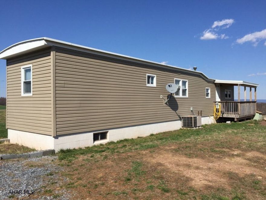 Beautiful views from this 9.2 acre property. Mobile home on full foundation. Great spot to build your dream house.