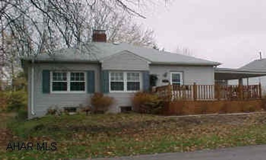 Immaculate ranch home with nice yard, hardwood floors and fireplace, new windows, siding and deck