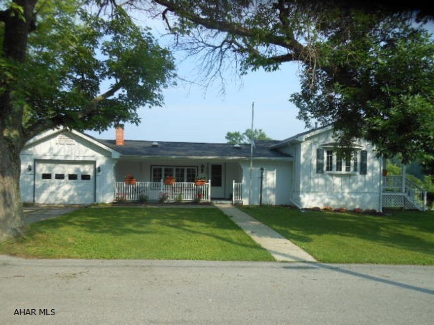 Walk, Walk, Walk to the YMCA, new library, schools, churches and Main Street activities & enjoy watching the golfers or just join in.. all minutes from this totally remodeled one story borough home. Bamboo floors, vaulted ceilings, lovely kitchen, brick fireplace, 4 large bedrooms, 1.5 bath and additional unfinished room for private Master Bath or office. Natural gas on the property too. Great corner lot and very cool courtyard area! Room for an additional carport/garage too. Home to the left will be razed in the Spring .....New Roof in the rear of the house June 2015.