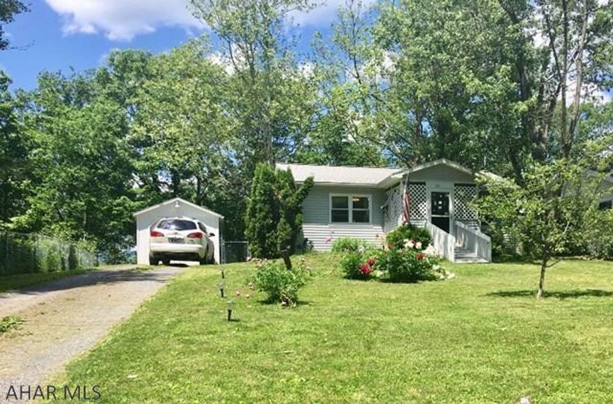 Single story bungalow minutes from Shawnee Lake. State Land just across the road. Newer windows, walk in shower, insulation, vinyl siding on house and newer garage roof. Well maintained and ready for you to kick back and relax! Year round home or vacation retreat.