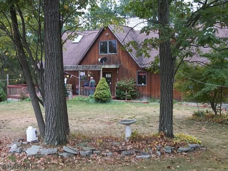Secluded A-Frame on 12.52 acres in Spring Cove School District. This 5 BR 3.5 bath home includes a 40x50 pole barn set up for horses, integral 2 car garage and a detached 4 car garage ready to be taken to the next level. Also has a Harmon outdoor furnace. Come see what this great property has to offer.