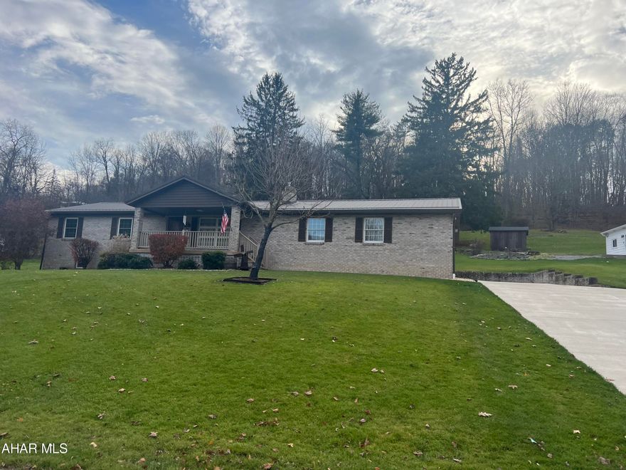 Beautiful brick ranch home on over an acre lot. This home features 3 bedrooms and 1.5 baths with modern equipped kitchen, nice living room, dining area, and enclosed rear 3 seasons room. The basement is finished with large family room with fireplace and 3/4 bath, computer area and furnace room. The oversized two car garage is attached and has concrete driveway which extends to a rear patio. This home is very clean and well maintained - move in ready!