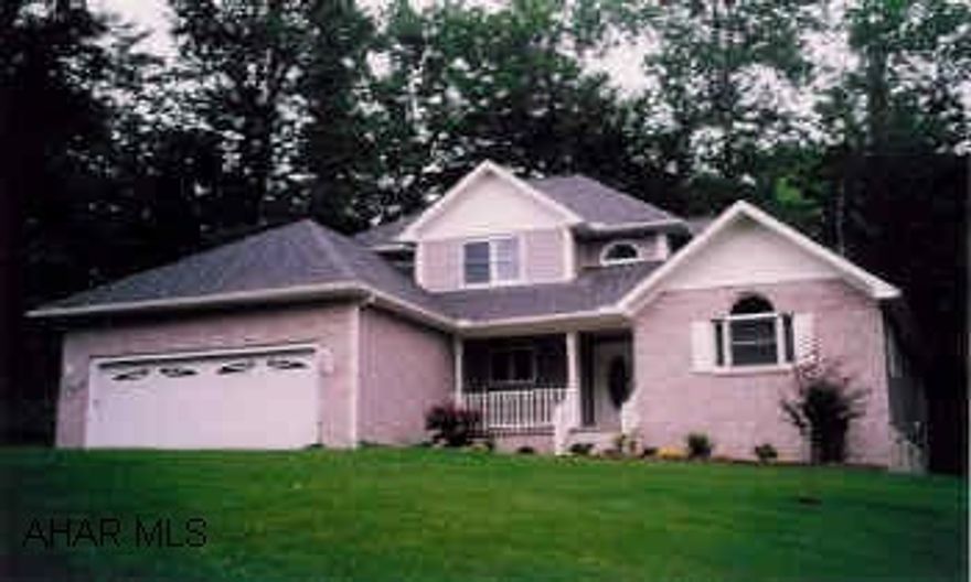 Brick/Vinyl Contemporary home with 3 Bedrooms, 2 1/2 baths, main level master bedroom. Gas fireplace in Great Room.