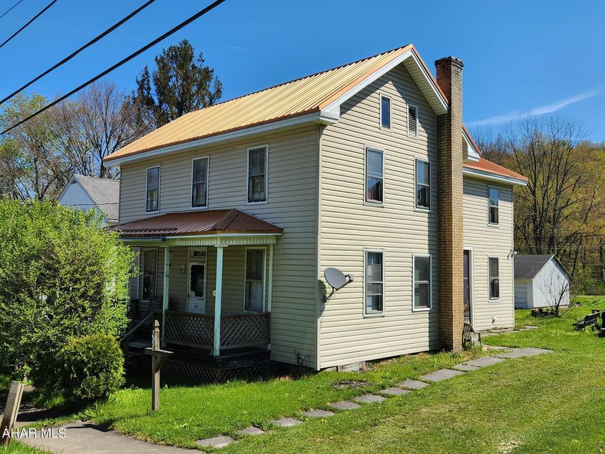 Investors - come check this one out!  5 Bed/2 Bath with huge kitchen and off street parking.  Must see to appreciate the potential!  Newer metal roof, newer siding and new furnace.  Bones of the structure are good.  Just waiting for your remodeling touches!  **sold as is - seller to make no repairs**  Make offers - motivated sellers